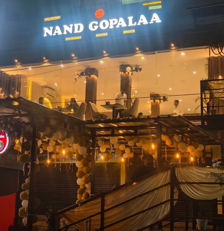 Nand Gopalaa glowing warmly at night